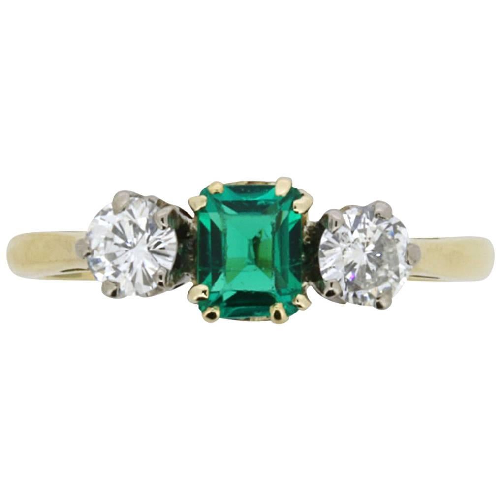 Art Deco Emerald and Diamond Three-Stone Ring, circa 1920s