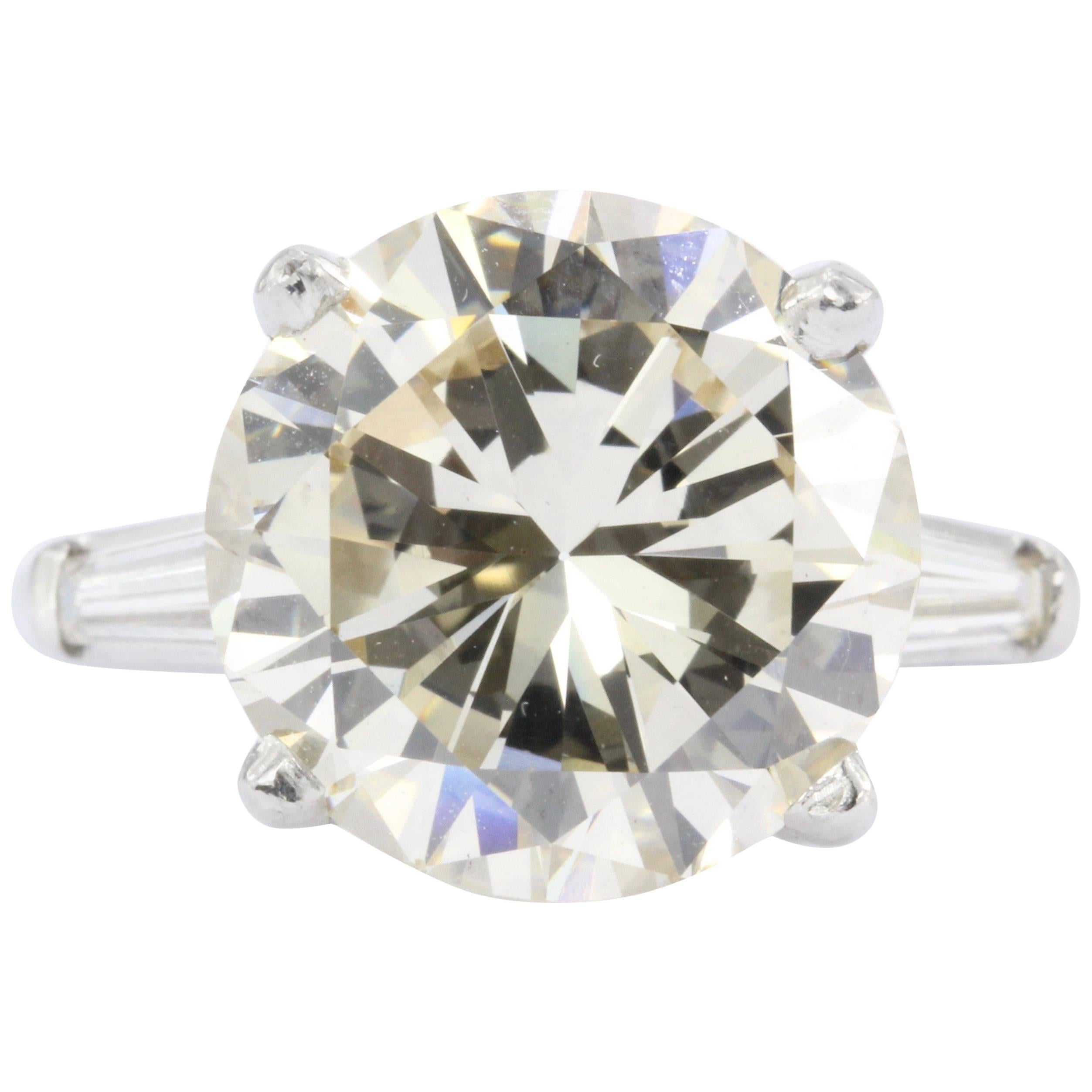 7.08 Carat Round Brilliant Diamond with Tapered Baguettes Ring