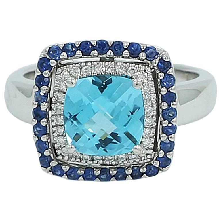Double Halo Diamond, Sapphire and Blue Topaz Ring For Sale