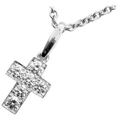 Collier pendentif en or blanc avec croix et diamants Cartier