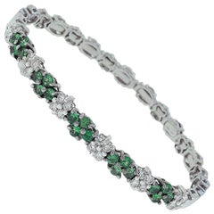 18 Karat White Gold Flower Design Diamond and Tsavorite Bracelet