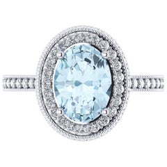 Anillo de oro blanco de 18k con aguamarina natural de 1,40 quilates y diamantes blancos