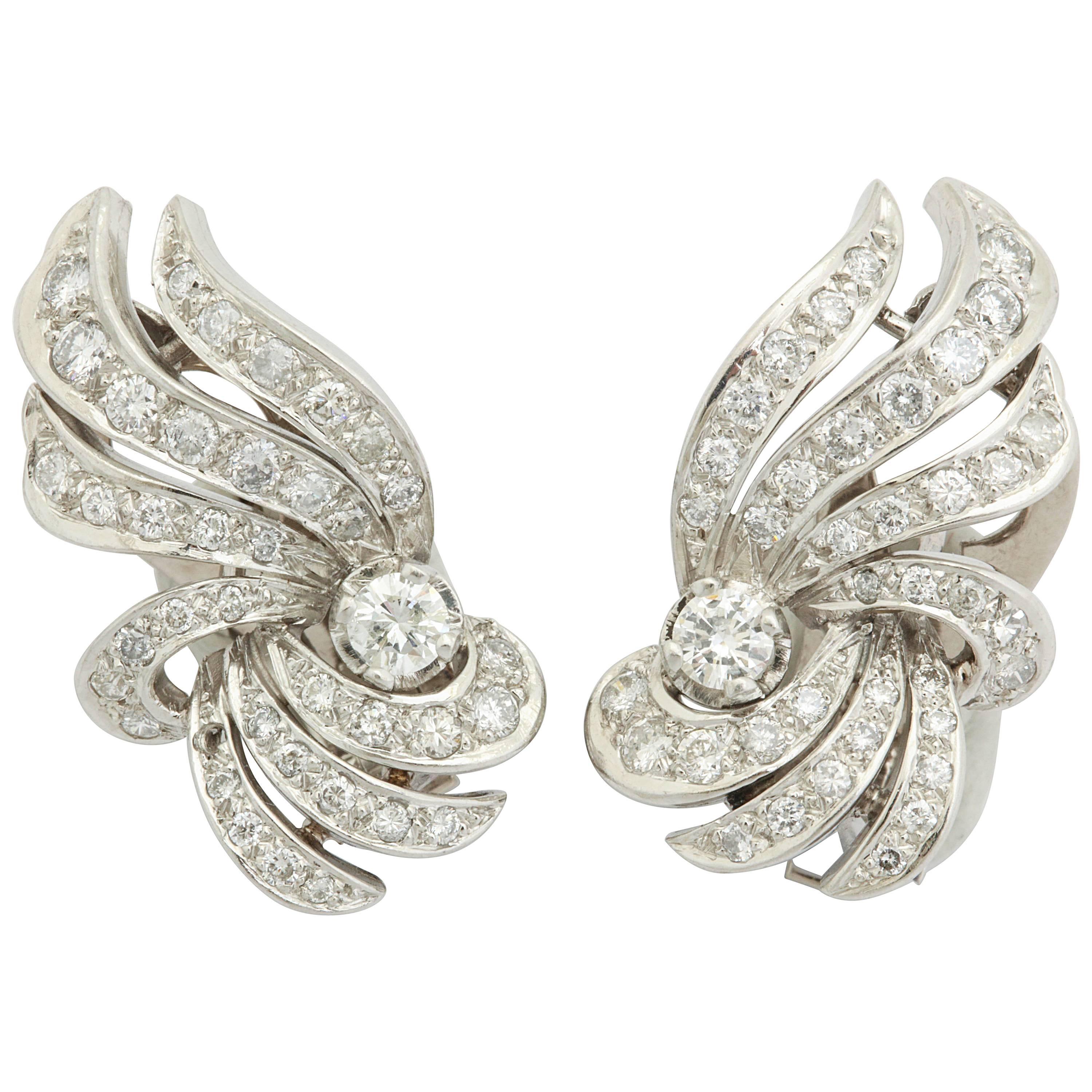 1950s Flame and Wing Design Diamond Encrusted Platinum Earclips with Posts