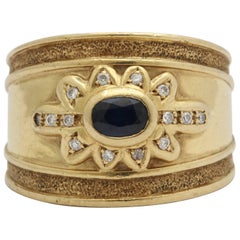 1980s Wide Hand-Hammered and High Polish Sapphire and Diamond Unisex Gold Ring