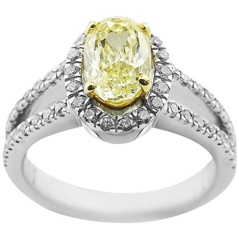  Fancy Yellow Oval 1.61 Carat Diamond Ring