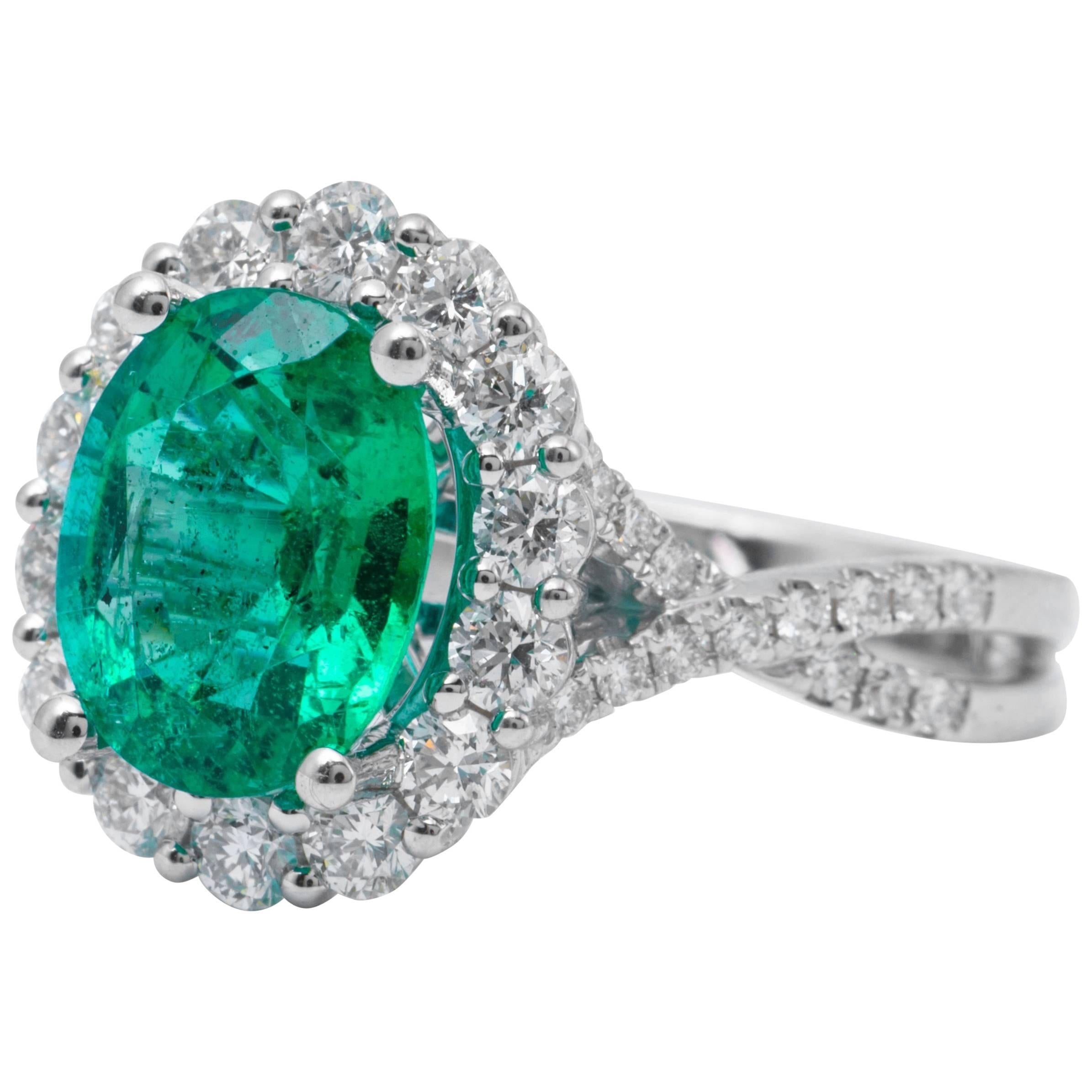 Emerald Diamond Halo Ring 18 Karat White Gold