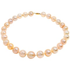 Large Fresh Water Pearl Necklace in Light Peachy Pink and Silver Hues Gold Clasp