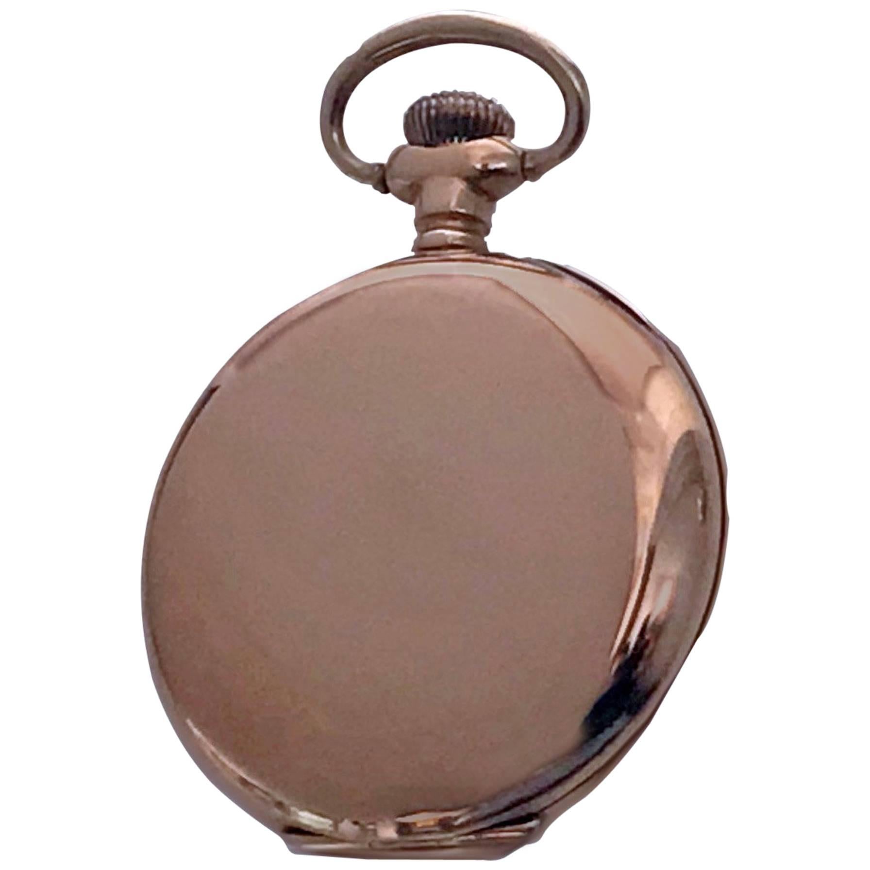 An American Waltham 14k stem wind Gold Hunter Case Pocket Watch, C. 1900. Case width 33mm. White porcelain dial with black Roman numerals, and an outer five-minute increment scale in red enamel, subsidiary dial at 6; American Waltham movement number