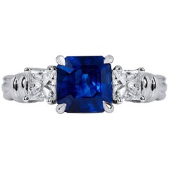 H & H 2.57 Carat Emerald Cut Blue Sapphire and Diamond Ring