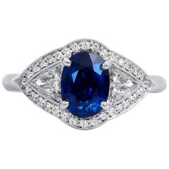 H & H 1.50 Carat Oval Royal Blue Sapphire and Trillion Cut Diamond Cocktail Ring