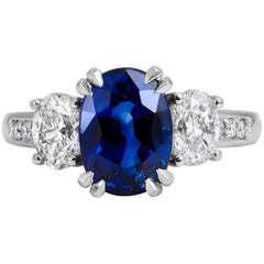 H 
H 3.55 Carat Oval Madagascar Blue Sapphire and Oval Diamond Fashion Ring