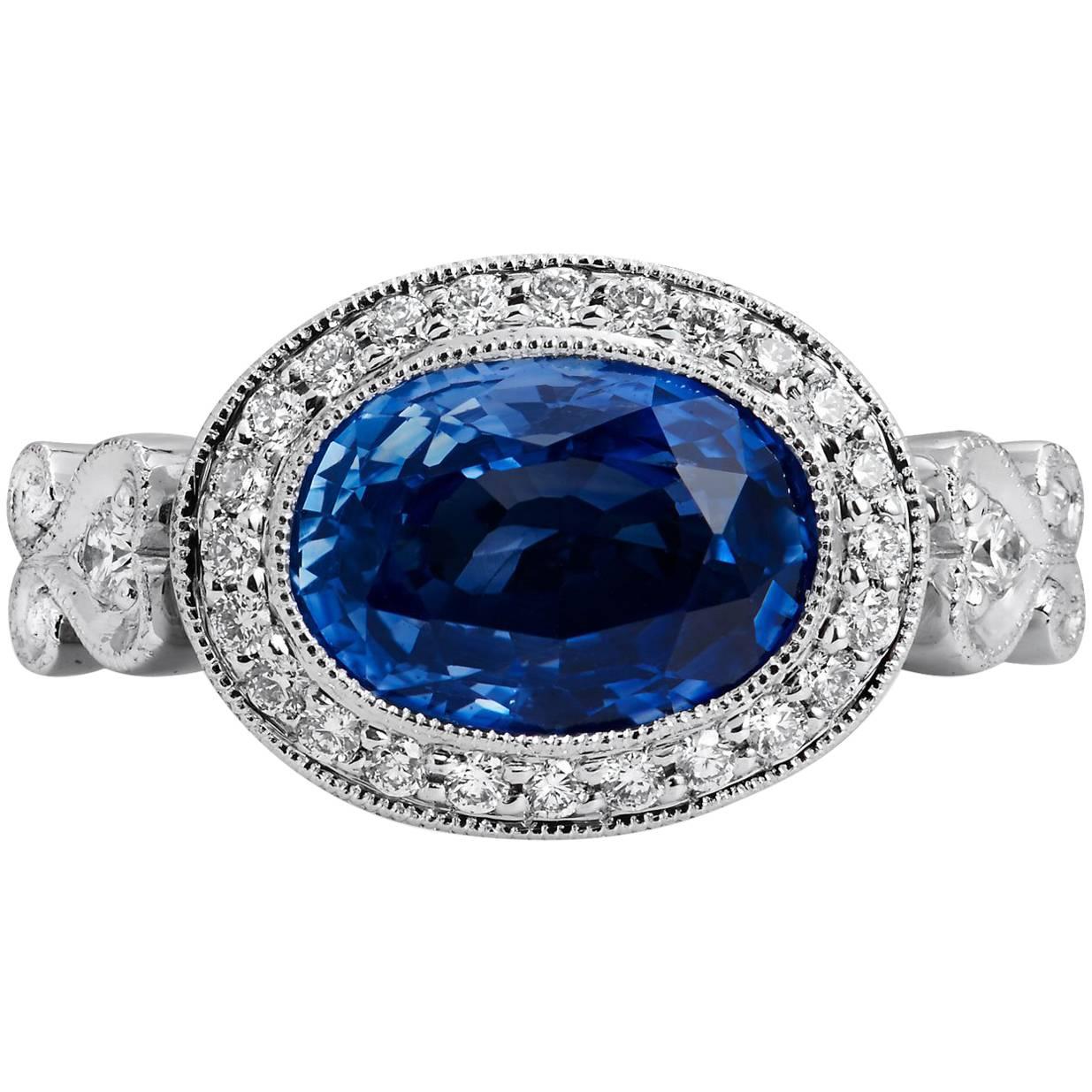 H & H 4.18 Carat Oval Sapphire and Diamond Pave Ring