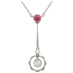 1910s Antique Ruby, Diamond, Pearl and White Gold Pendant