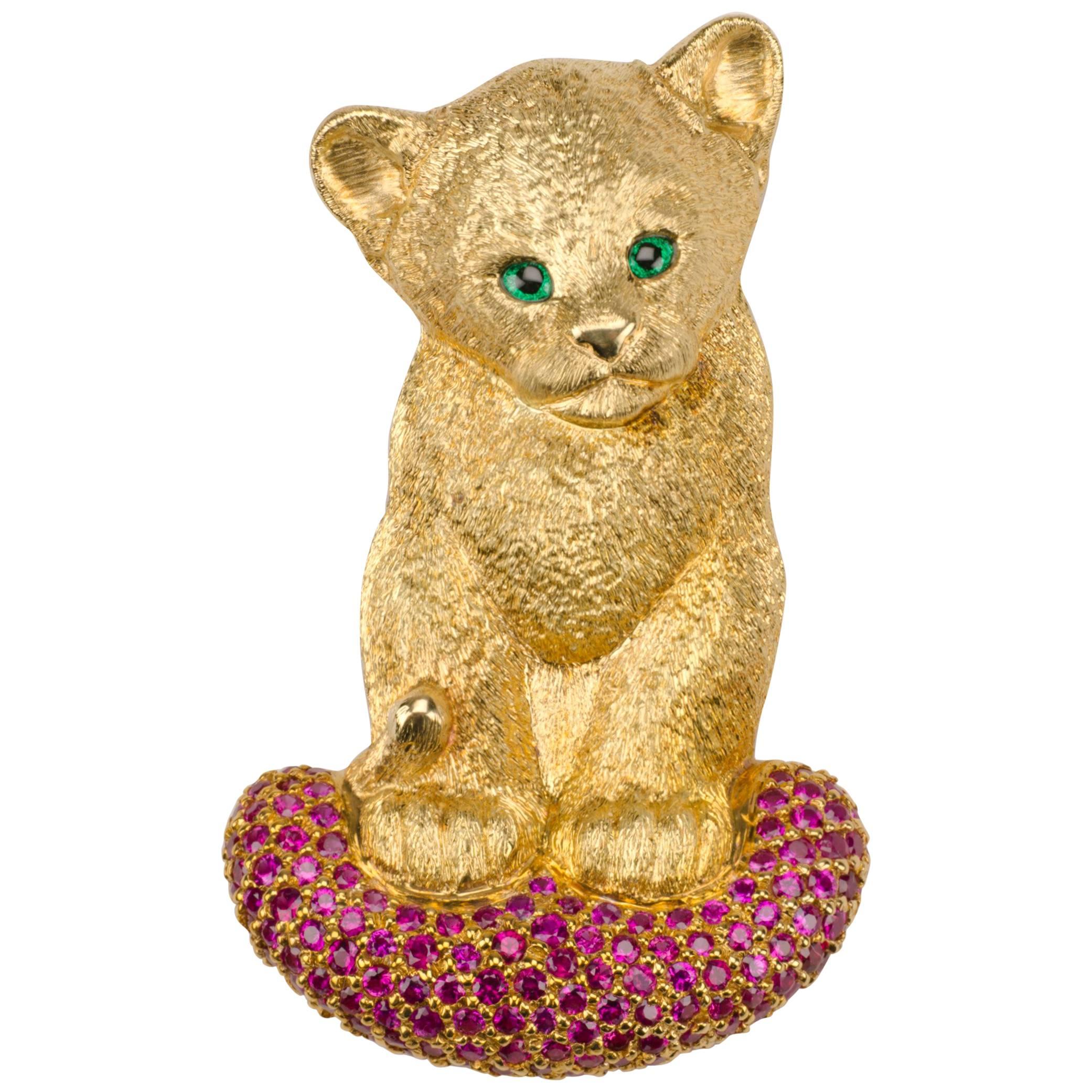 18 Carat Yellow Gold Lion Cub Brooch or Pendant with a Cushion of Rubies For Sale