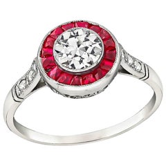 Charmante bague halo de diamants et rubis de 0,50 carat