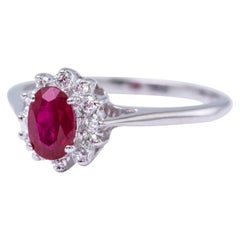 Oval Ruby and Diamonds Halo Ring
