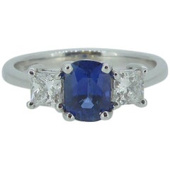 Sapphire and Diamond Engagement Ring in Traditional Style