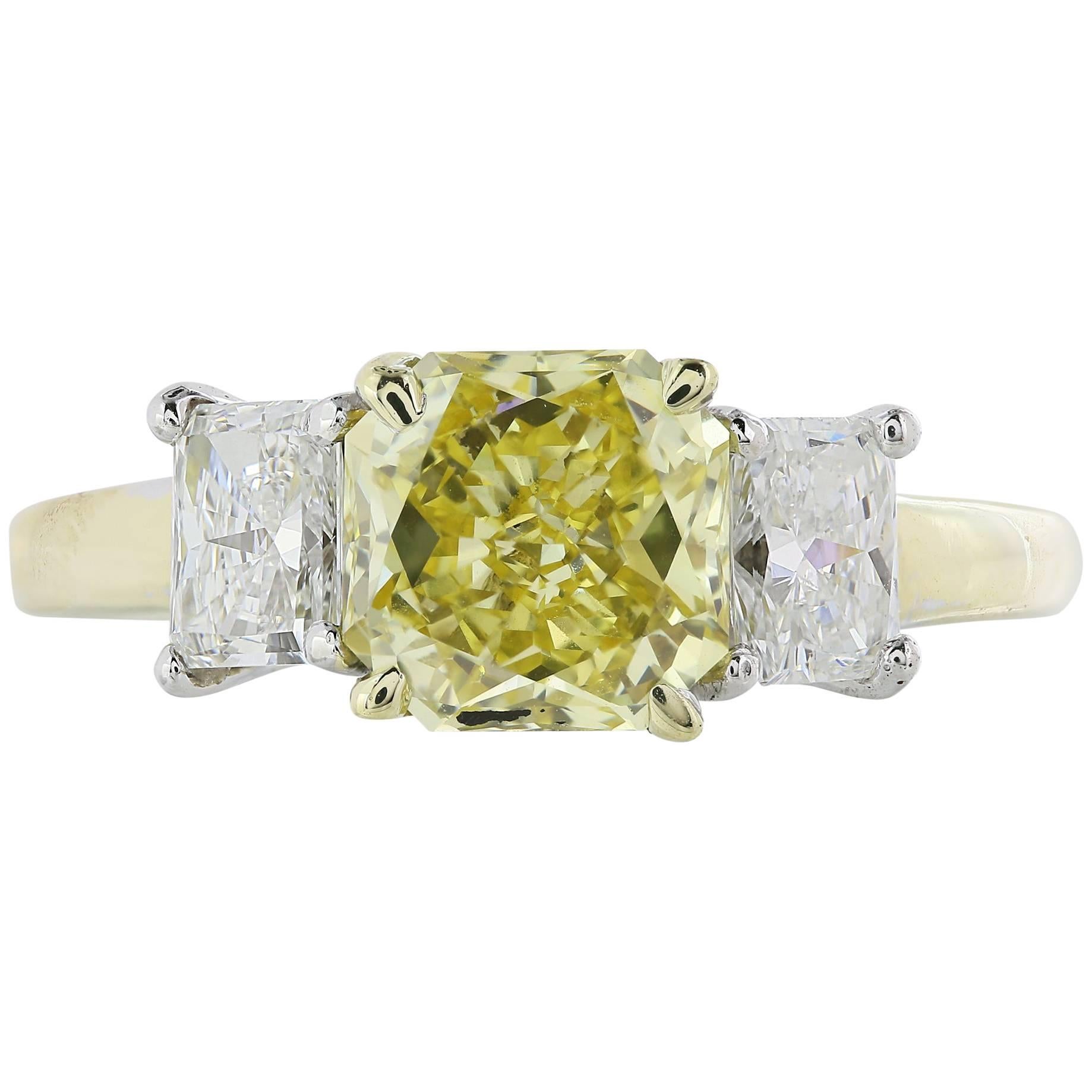1.66 Carat Fancy Yellow Diamond Three-Stone Ring For Sale