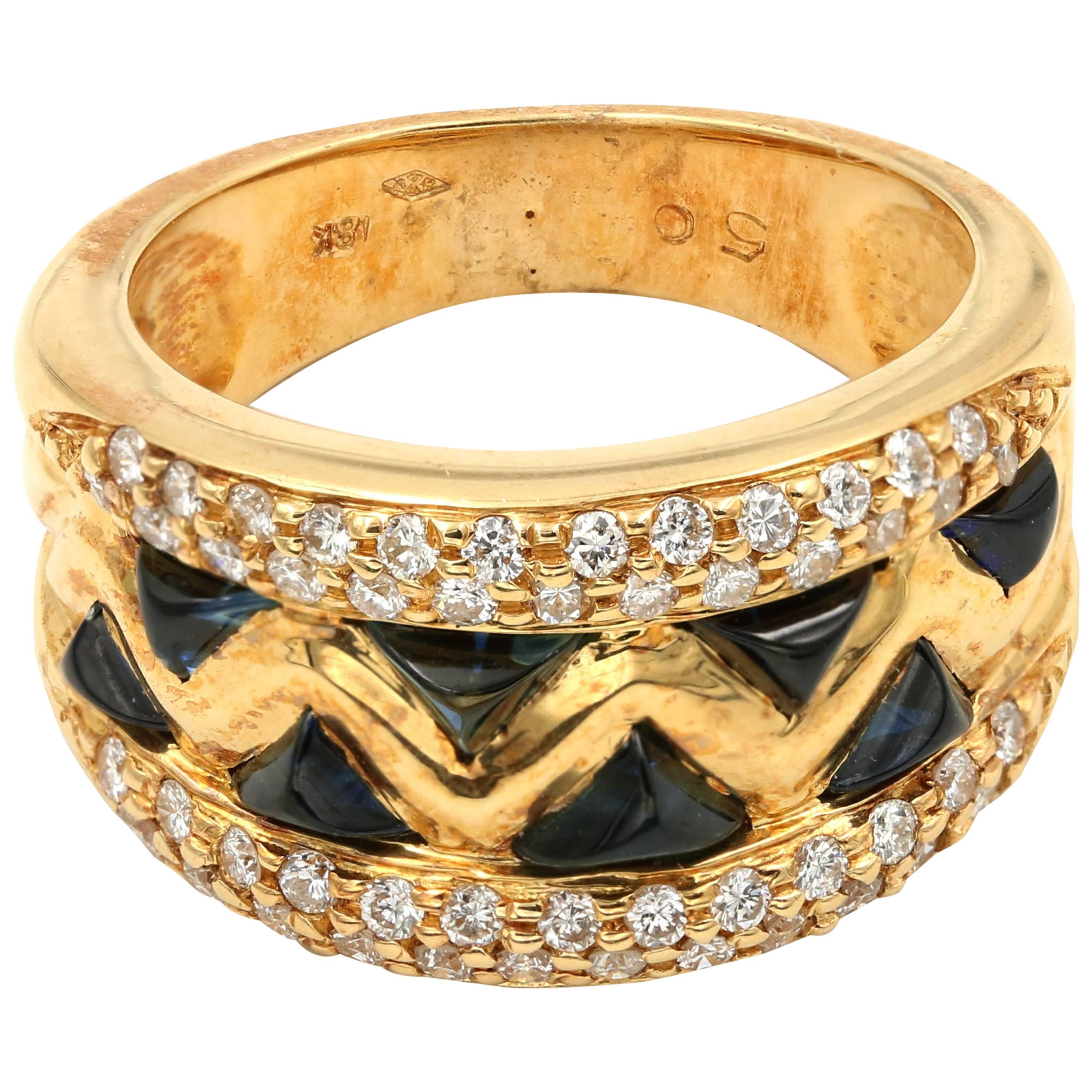French "Jaws" Ring with Sapphire and Diamonds in 18 Karat Yellow Gold For Sale