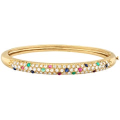 Diamond and Gemstone Bangle by Van Cleef & Arpels