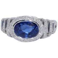 Bague cocktail en saphir bleu non chauffé et diamant certifié AGTA