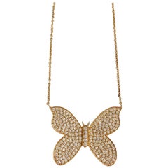 Collier de papillons en or jaune avec diamants pavés