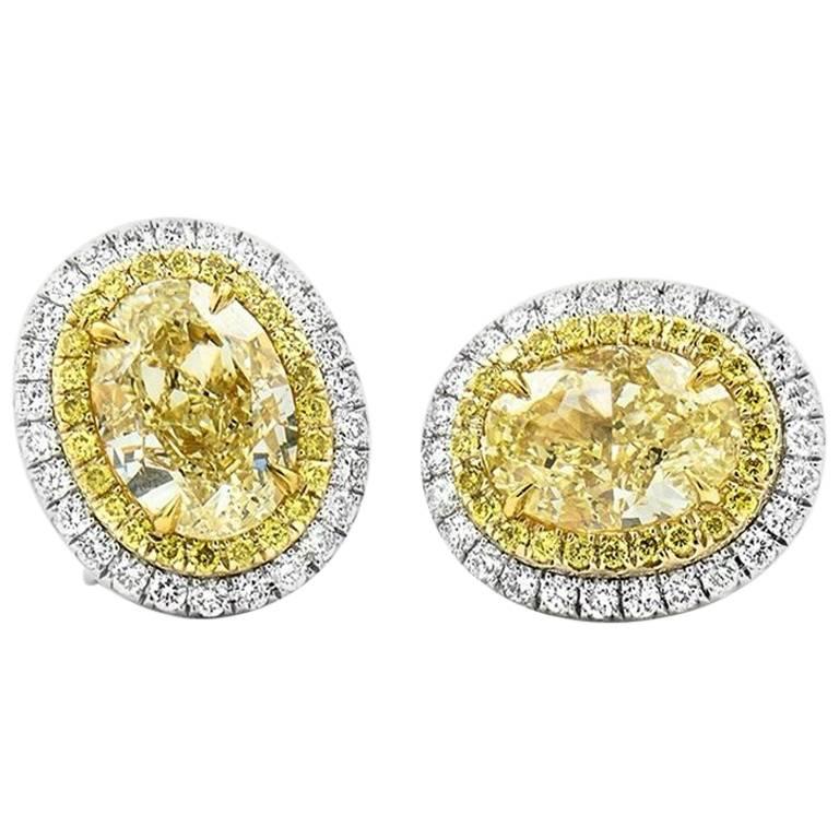 GIA Oval Fancy Yellow Diamond Earrings