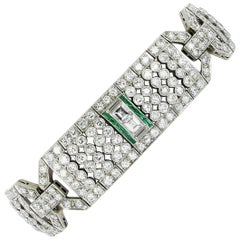 Magnifique bracelet Art déco en platine avec émeraudes et diamants