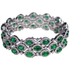 15.69 Carat Oval Zambian Emerald Diamond 18 Karat Gold Three-Row Bracelet