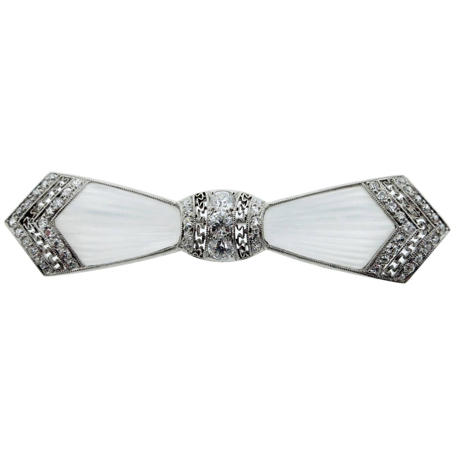 Marcus & Co. Art Deco Platinum Diamond and Carved Crystal Bow Pin For Sale