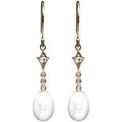 Diamond and Freshwater Pearl Dangle Earrings in Yellow Gold