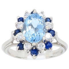 Aquamarine and Diamond Halo Cocktail Ring
