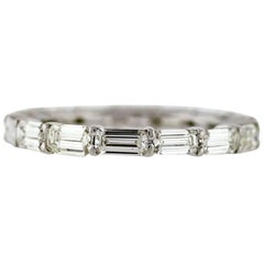 East to West Emerald Cut Diamond Eternity Band Made in Platinum