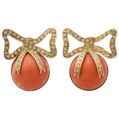 1960s Cabochon Angel Skin Coral and Diamonds Wrapped in a Bow Gold Earclips