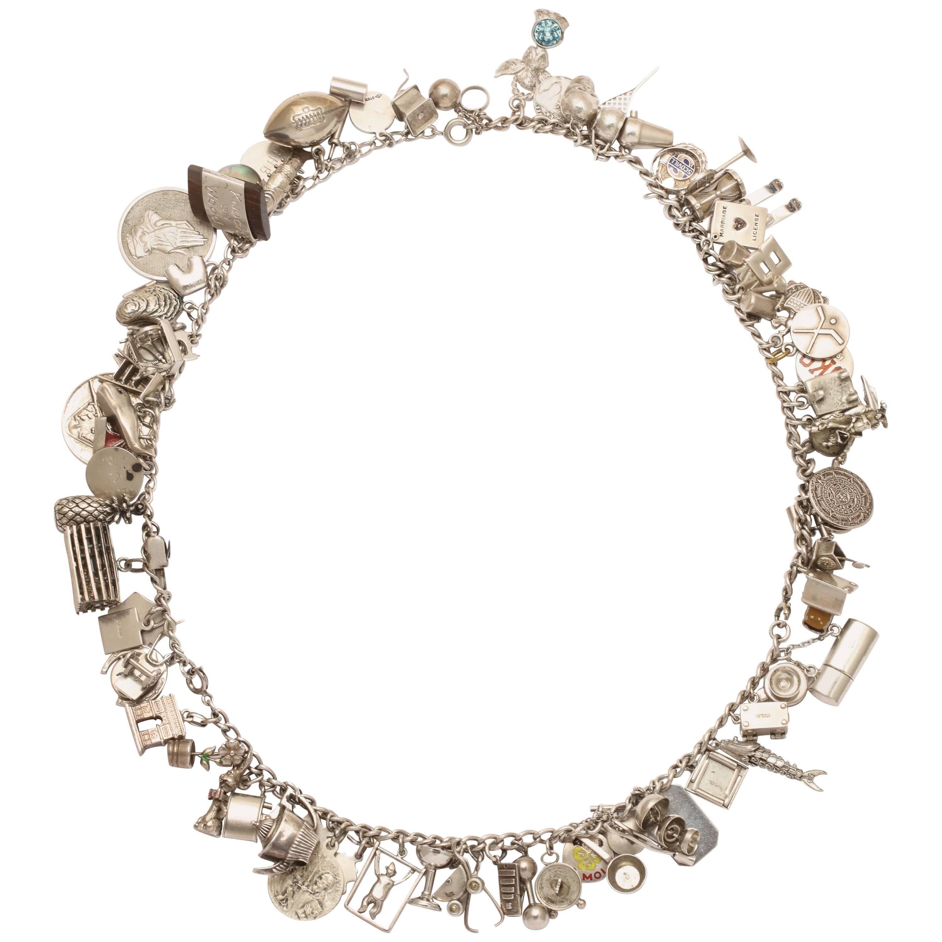 Fulsome Sterling Silver Charm Necklace, circa 1940s