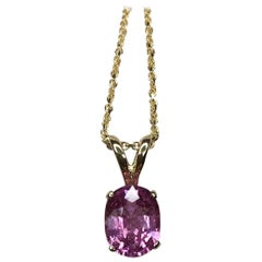 Untreated Vivid Pink Sapphire 1.00 Carat Solitaire Oval Cut Yellow Gold Pendant