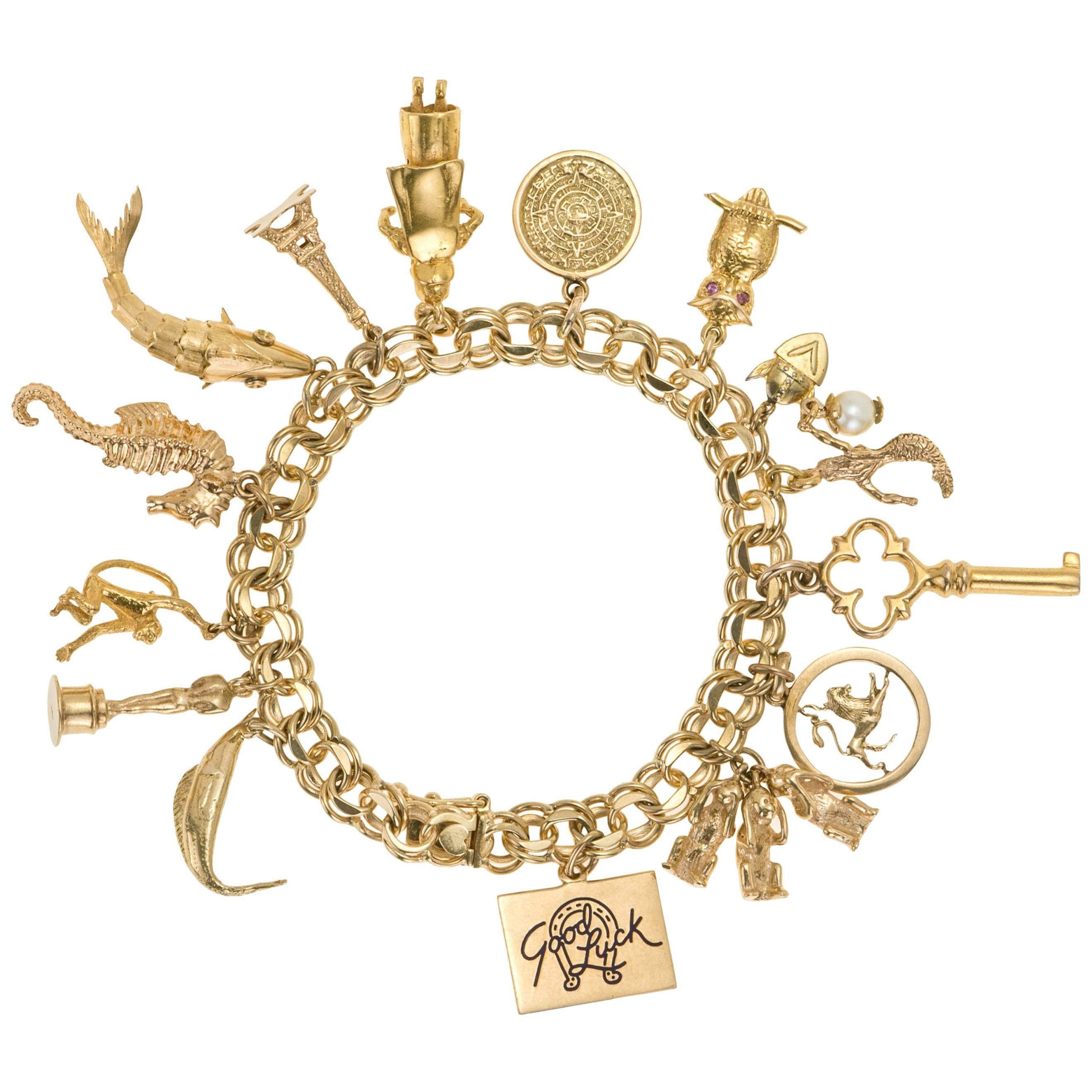 Vintage 14 Karat Yellow Gold 15 Charms, Charm Bracelet