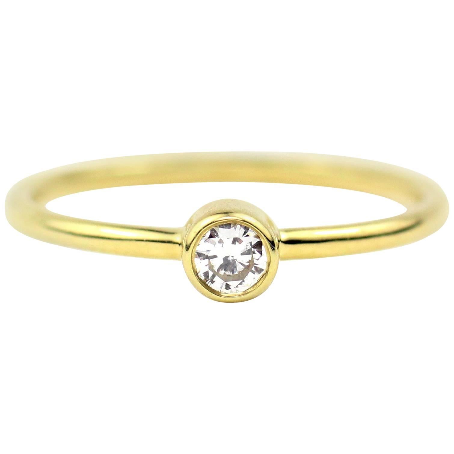 Julius Cohen Gold and Round Diamond Ring