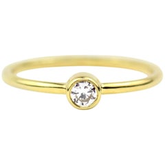 Julius Cohen Gold and Round Diamond Ring