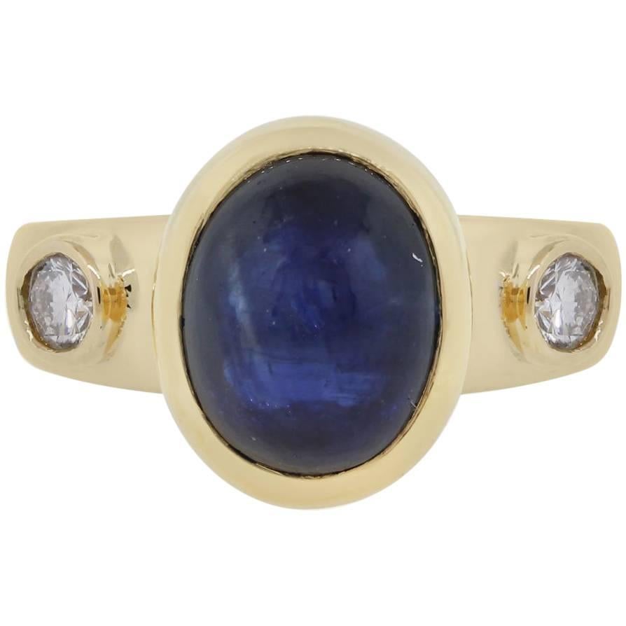 Oval Cabochon Sapphire and Diamond Ring