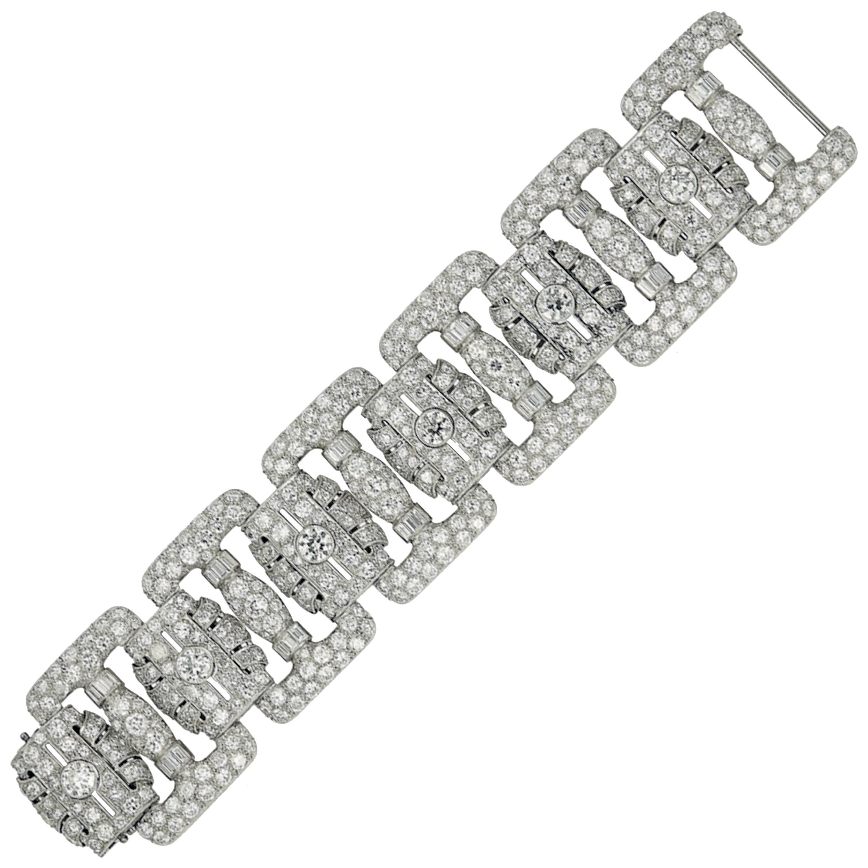 American Art Deco Diamond Platinum Bracelet
Composed of six rectangular openwork panels, the connecting links of geometrical design, set throughout with old-cut diamonds.
Circa 1930.
Total diamond: approximately 45.00 carats.
Length: 7.40 inches