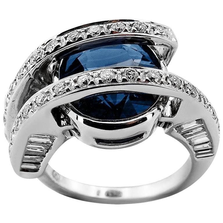 White Gold with Oval Cut Sapphire and Brilliant/Baguette Cut Diamonds Ring For Sale