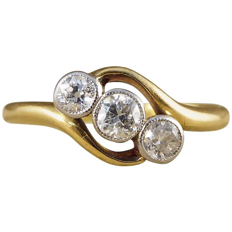 Antique Edwardian Diamond Three-Stone Twist 18 Carat Gold and Platinum Ring