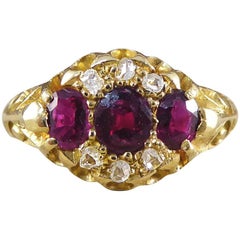 Edwardian Garnet and Diamond Ring Modeled in 18 Carat Gold