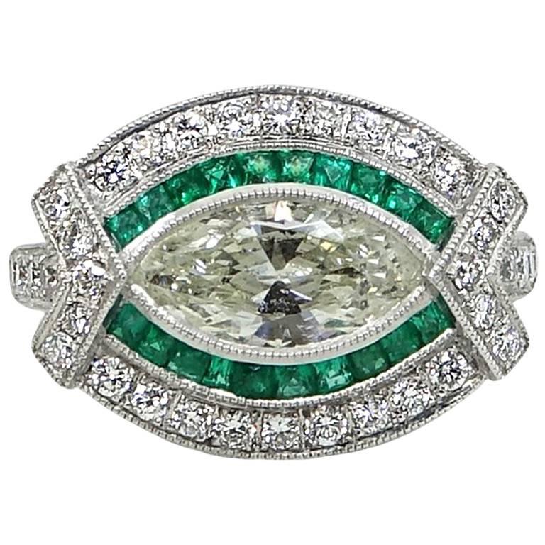 Marquise Diamond and Emerald Platinum Ring