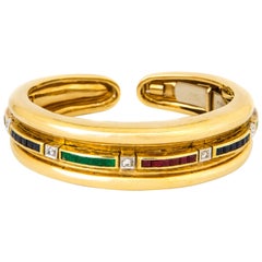 Diamond, Emerald, Ruby, Sapphire and 18 Karat Gold Bracelet by Andrew Clunn