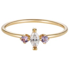 Sweet Pea 18k Gold Marquise Diamond and Pink Sapphire Engagement Ring Sweet Pea 18k Gold Marquise Diamond and Pink Sapphire Engagement Ring