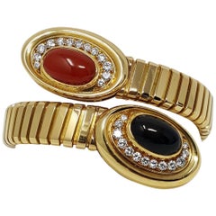 18 Karat Yellow Gold Bvlgari Tubogas Serpentine Coral and Onyx Bracelet