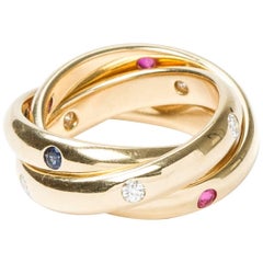 Cartier White Diamond Ruby Blue Sapphire Yellow Gold Band Ring