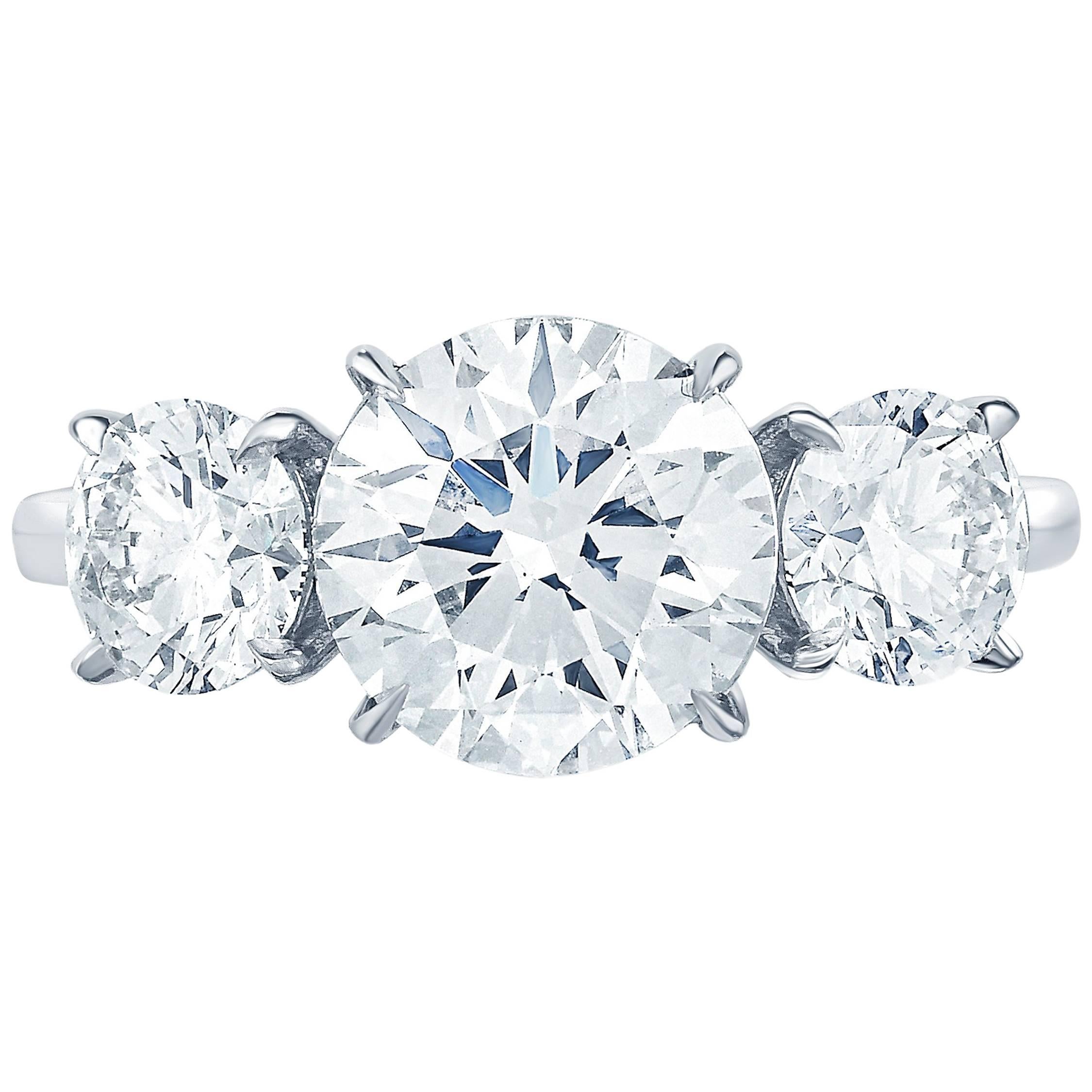 Marisa Perry Three-Stone Round Brilliant Engagement Ring in Platinum
